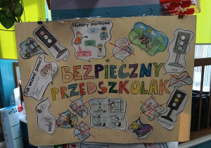 Na zdjęciu widać plakat wykonany przez dzieci pt. "Bezpieczny przedszkolak".